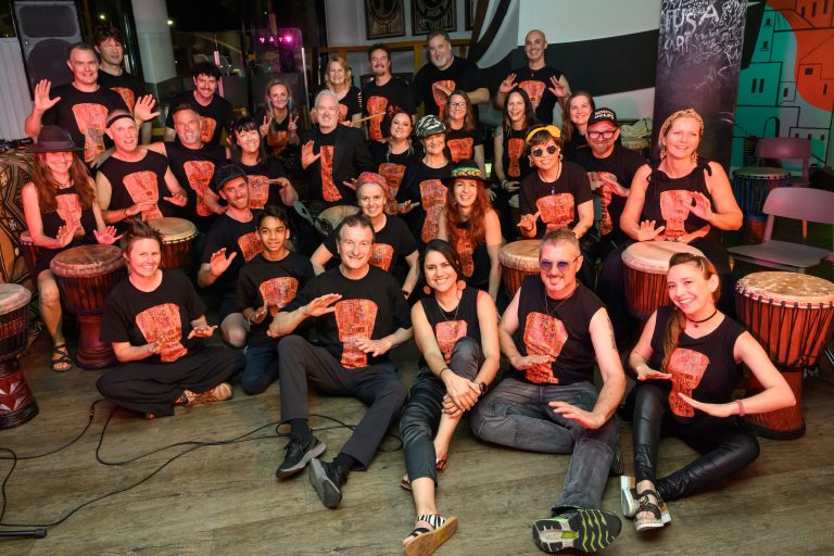 Zormiwasa at the Little Big Bang - Africa Electronica, in Magandjin (Brisbane). From left to right, back to front Jeremy Kirby, Justin Boyle, Evan Kidd, Shan Fay, Marianna Joo, Darryl Jones, Michael Charles, Pasquale Heredia, Micaela Diestel, Gal Baras, Jason Callender, Gabi Donovan, Elliott Orr, Lara Pape, Leah Mann, Sanj Smith, Tracey Davis, Nicole Bowden, Rohan Tripsmith, Carolyn Folland, Virginie Marley, Sheila, Luke Styles, Valerie Geffroy, Brooke O'Brien, Isaac Kennedy, John Pietryszyn, Maritza Sullivan, Terry Sullivan, Gina Cardenas. Photo credit Stephen Cameron.