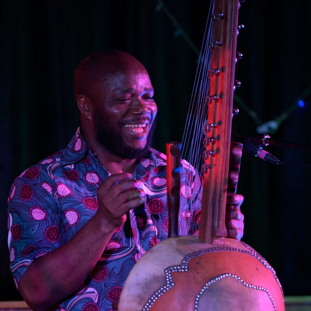 Lansana Camara - performing on the kora at the Little Big Bang - Africa meets India. Mullumbimby Civic Centre April 6, 2024